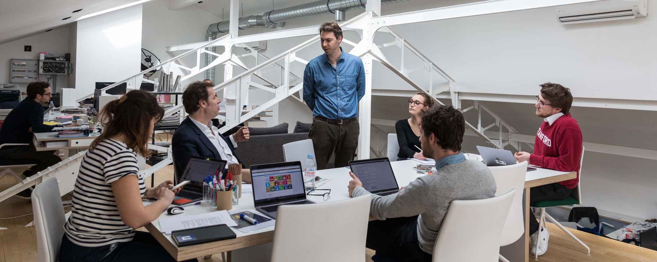 Julien-working-in-office-business-laptop-triodos-bank